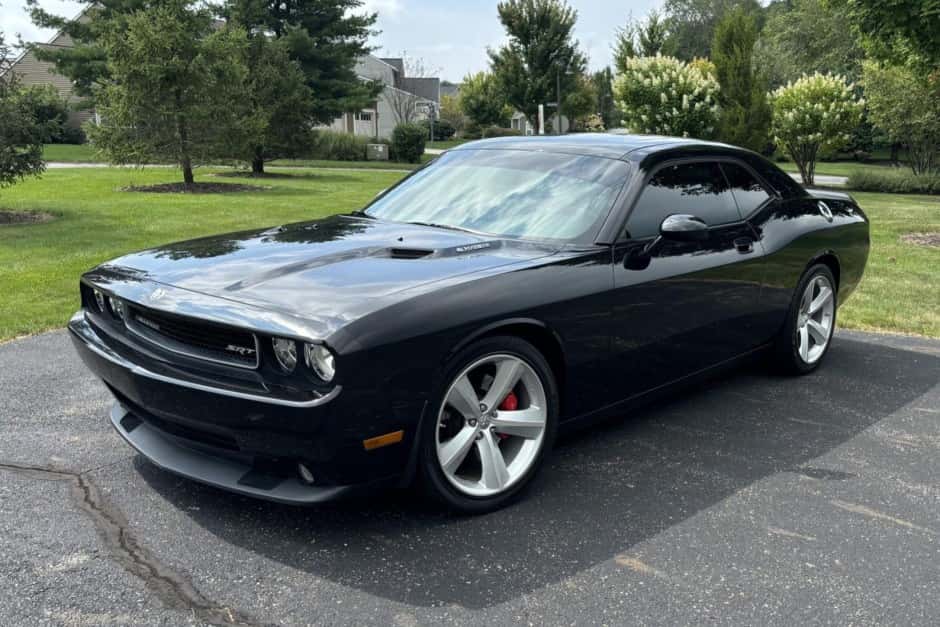 2009 Dodge Challenger SRT8 & 392 sold for $21,000