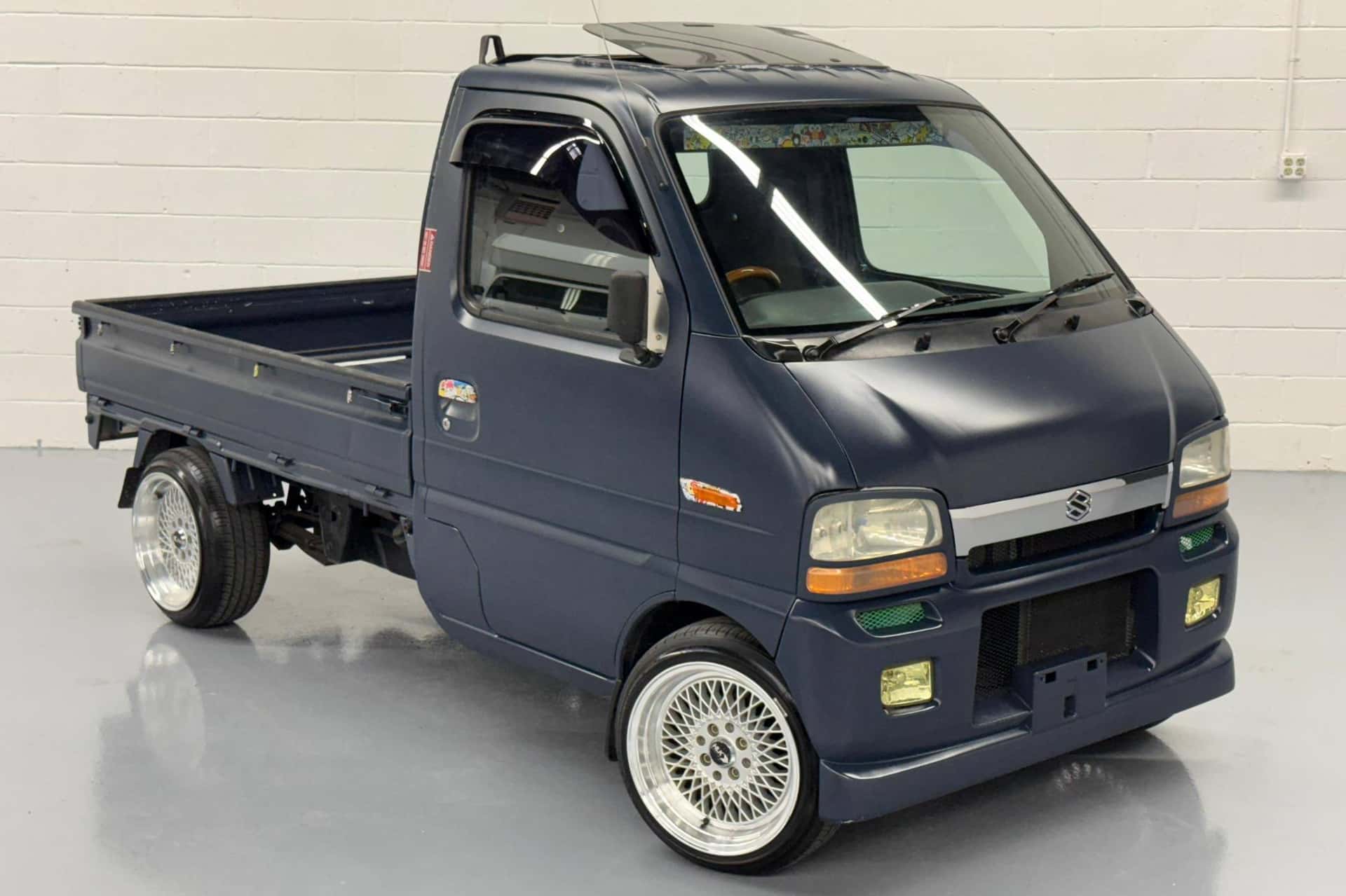 1999 Suzuki Carry Truck sold for $7,600