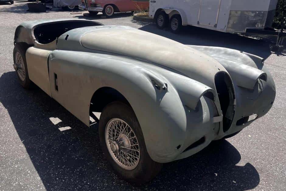 1955 Jaguar XK140 sold for $8,700