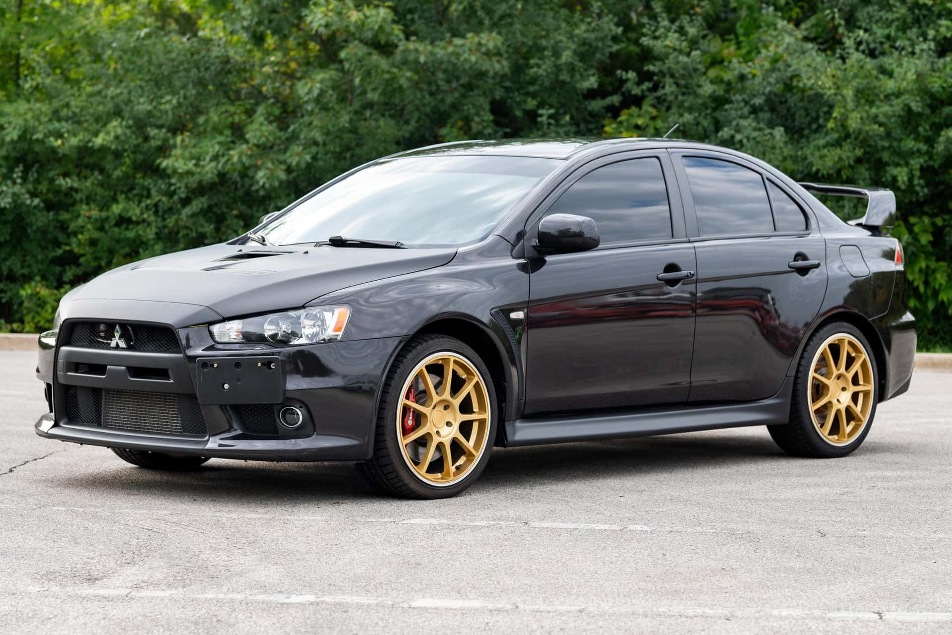 2011 Mitsubishi Lancer Evolution sold for $21,750
