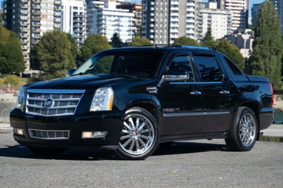 2012 Cadillac Escalade & EXT GMT900 (2007-2014) sold for $19,000