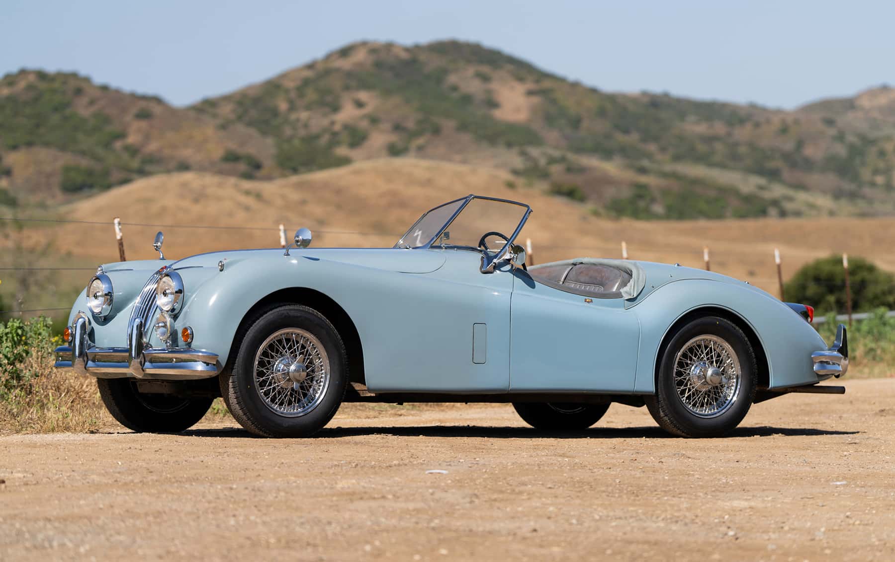 1956 Jaguar XK140 MC Roadster sold for $117,600