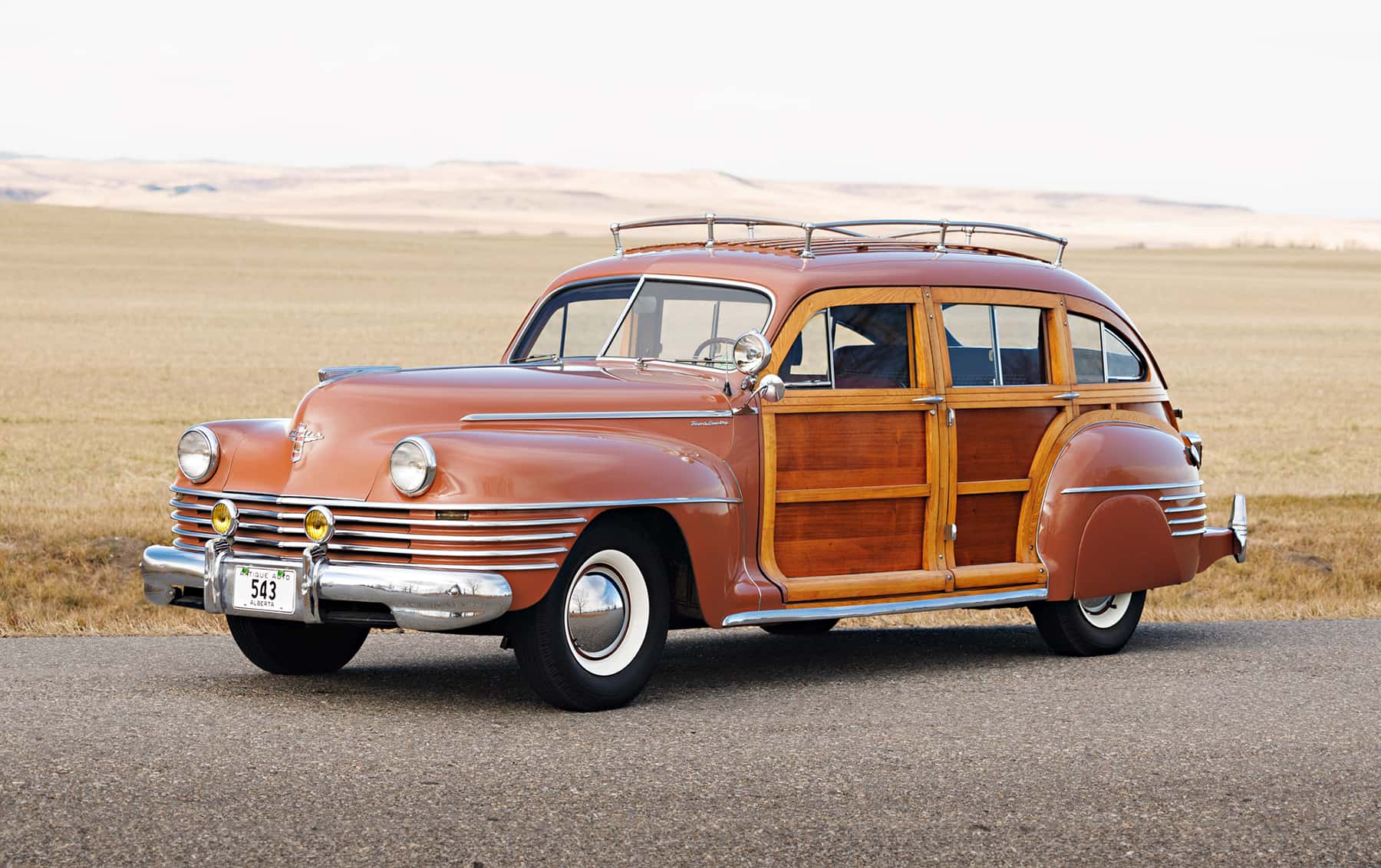 1942 Chrysler Windsor Town and Country Barrelback sold for $117,600