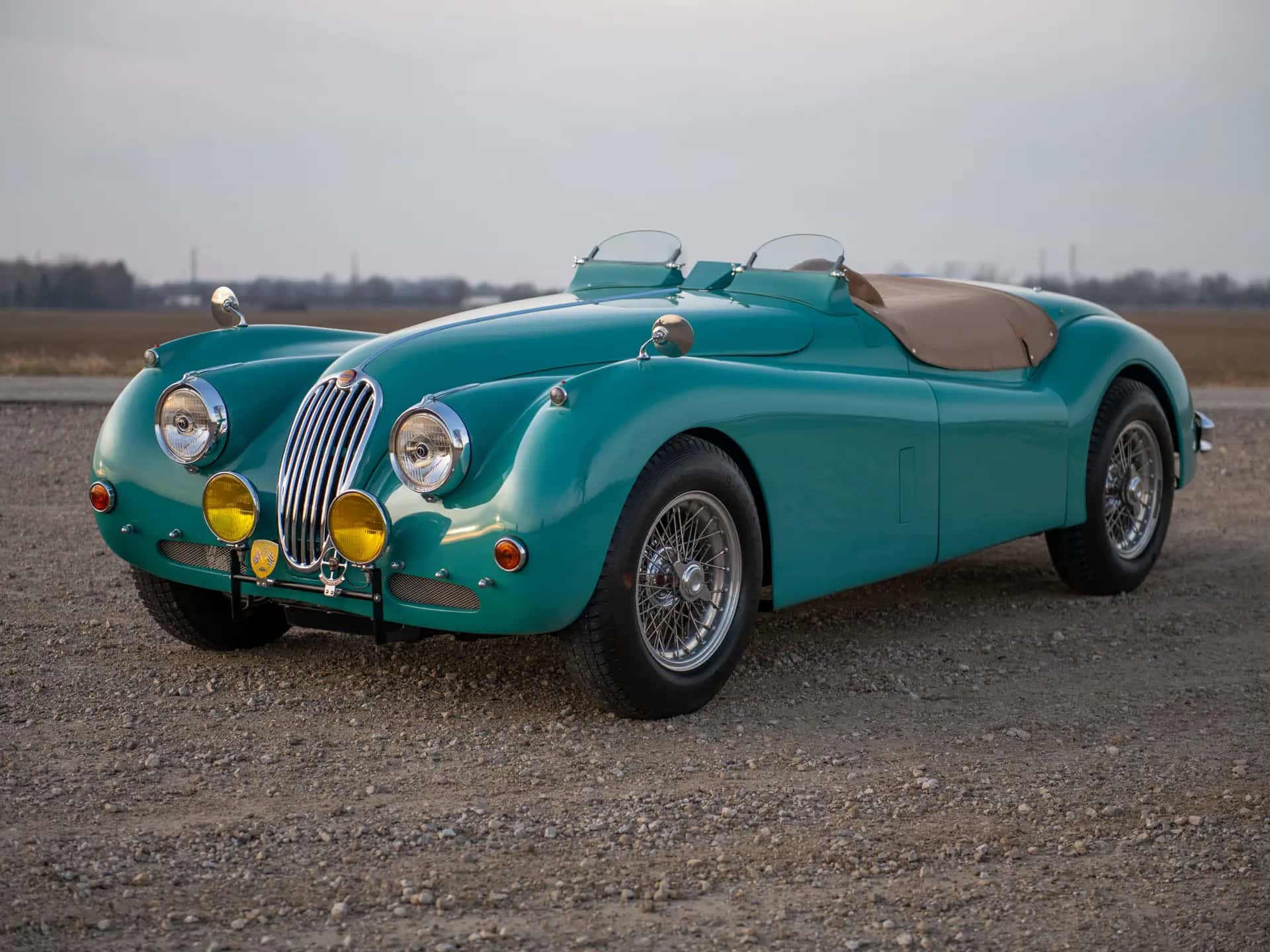 1956 Jaguar XK 140 MC Roadster sold for $168,000