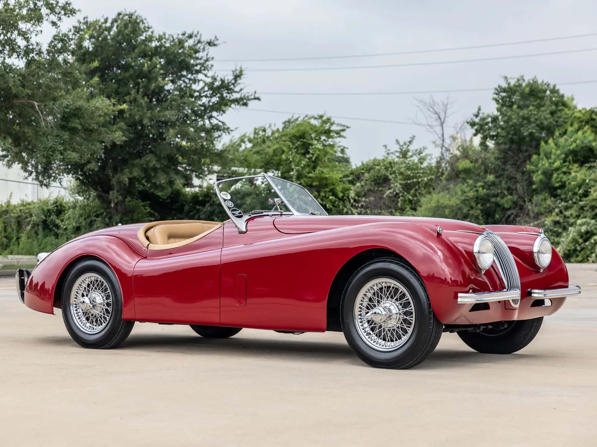 1954 Jaguar XK 120 SE Roadster sold for $143,360