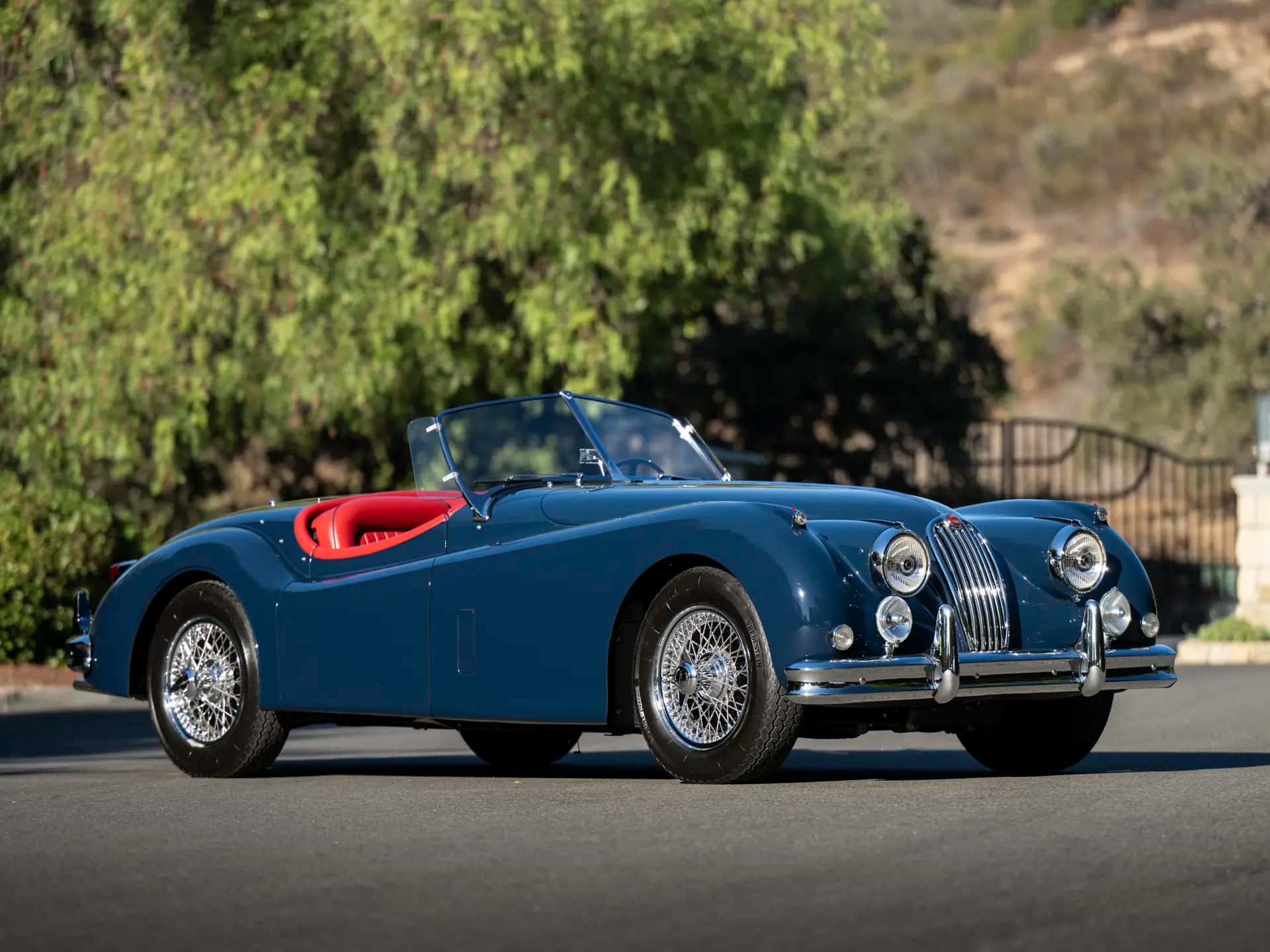 1955 Jaguar XK 140 MC Roadster sold for $145,600
