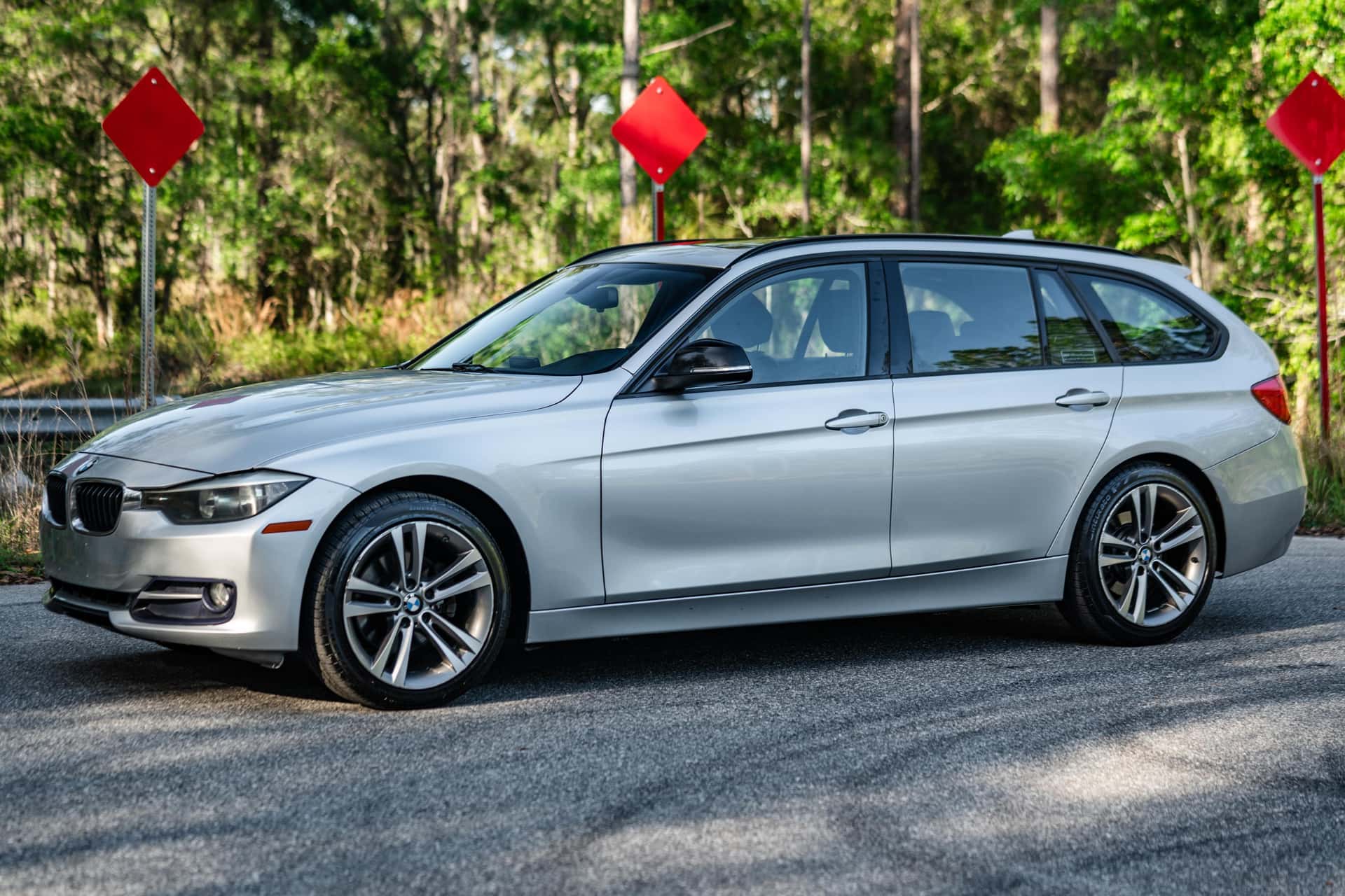 2014 BMW 3 Series sold for $9,000