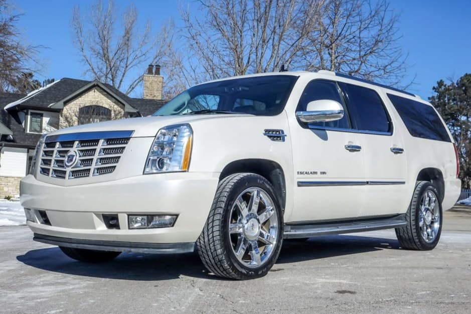 2011 Cadillac Escalade & EXT GMT900 (2007-2014) sold for $15,000