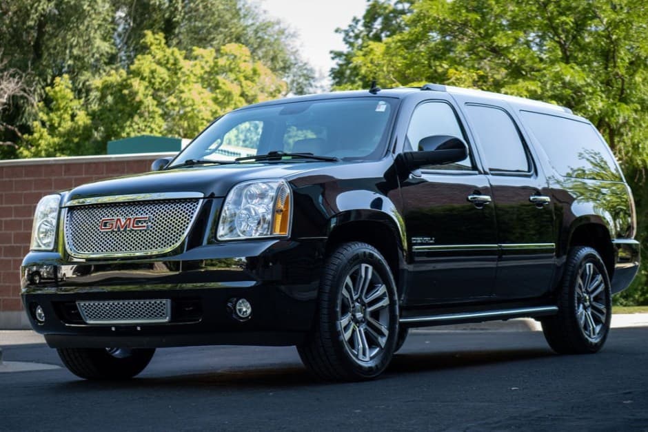 2011 GMC Yukon GMT900 sold for $28,000