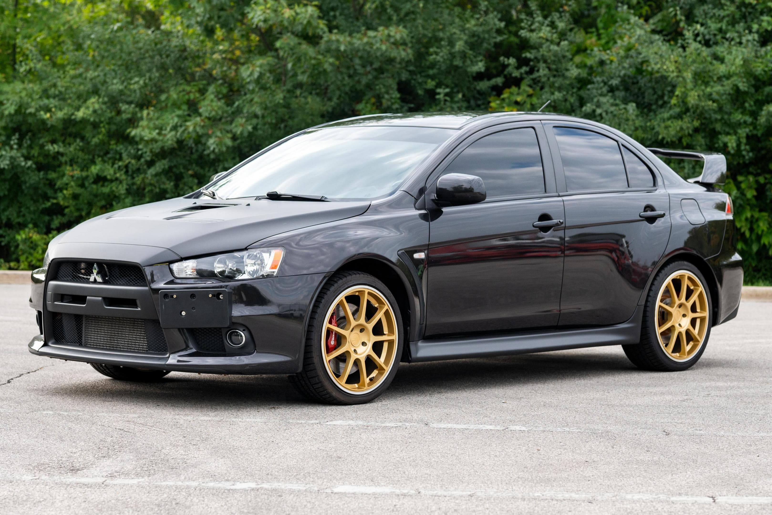 2011 Mitsubishi Lancer Evolution sold for $21,750