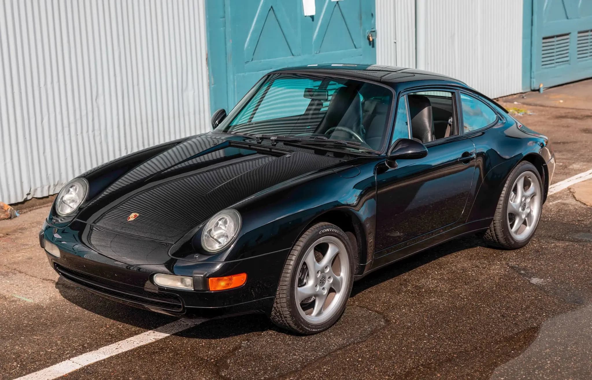 1996 Porsche 911 Carrera sold for $100,993