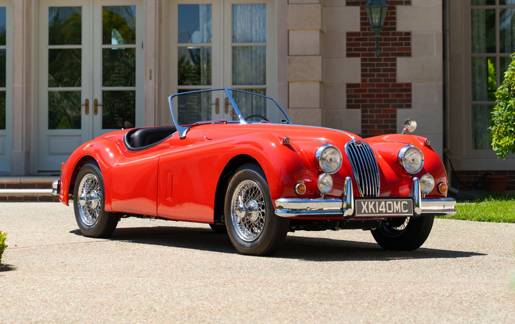 1956 Jaguar XK140 MC Roadster sold for $134,400