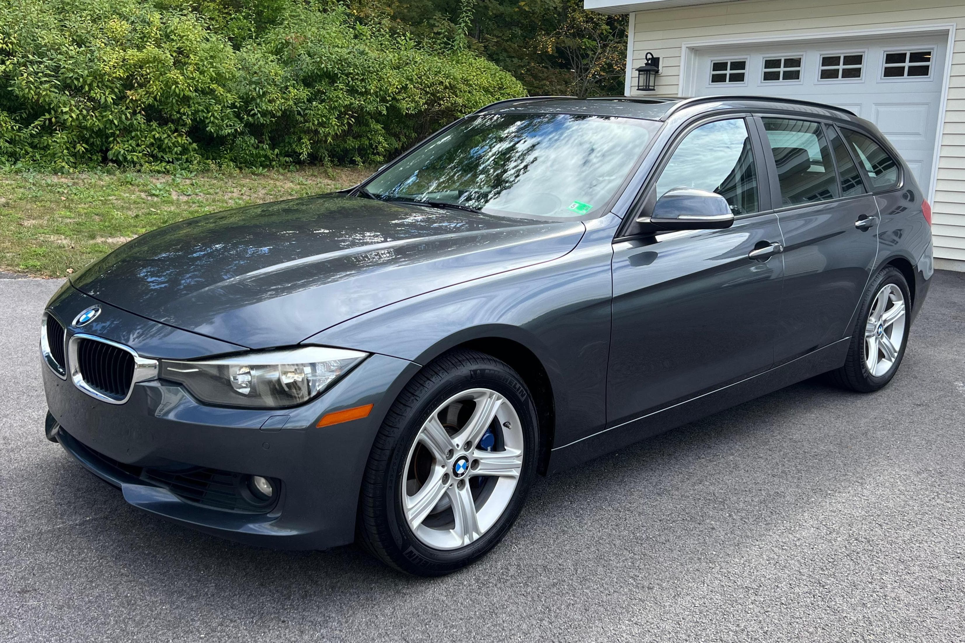 2014 BMW 3 Series sold for $9,600